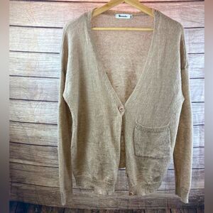 Ladies sweater sized M/Lg by Vernacular
